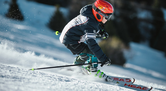 child skiing improving performance