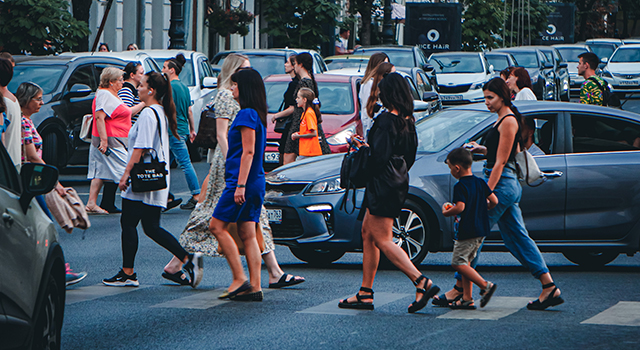 City crosswalk with people and traffic