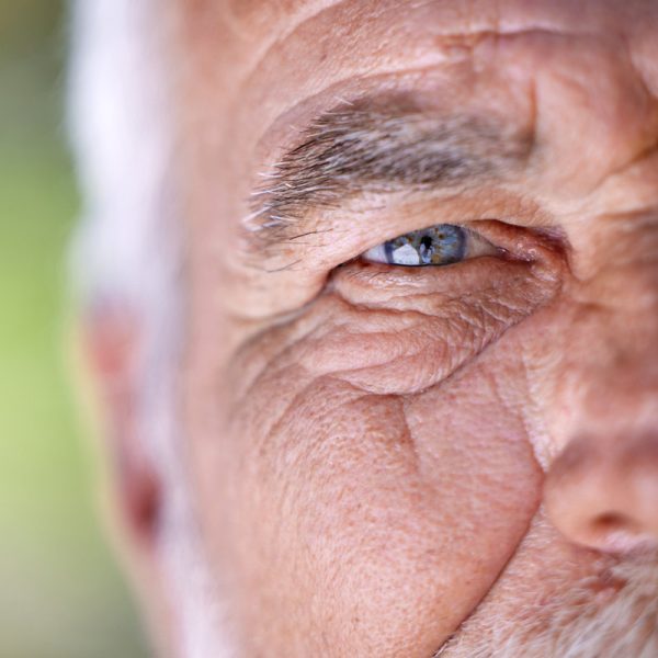 Close up of the eye of a senior man