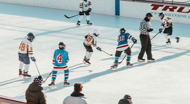 Men Playing Ice Hockey