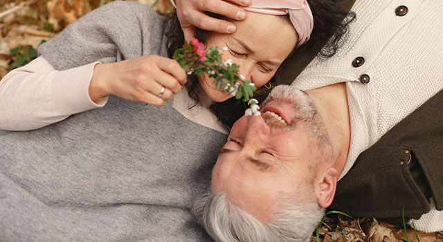 elderly couple smiling