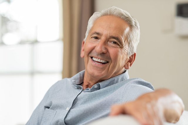 Smiling senior man enjoying clear healthy vision after Glaucoma surgery 640x427