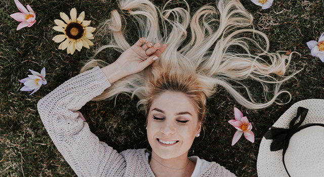 Woman with contacts lying on the ground