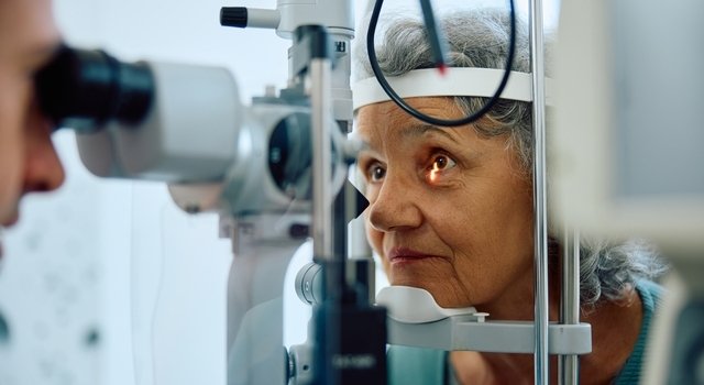 senior woman at a diabetic eye exam