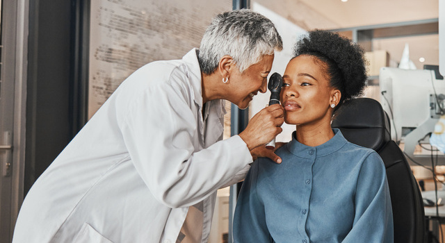 young woman at an eye exam